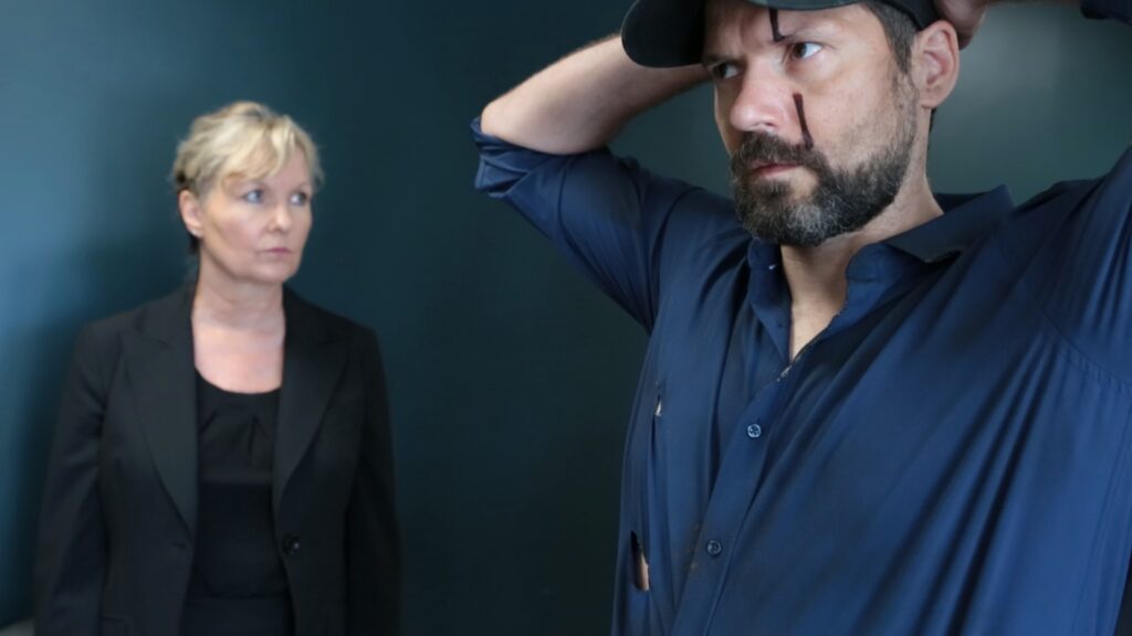 Blackwater Receptionist area Screenshot Word and Deed Miller hands up frisk